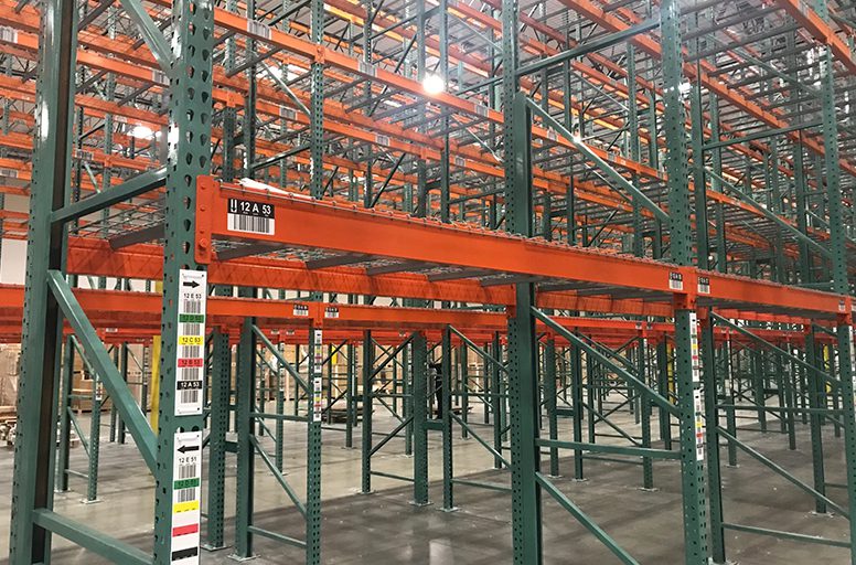 A warehouse with many racks and shelves.