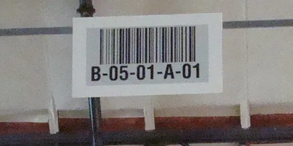 A sign with a barcode on it